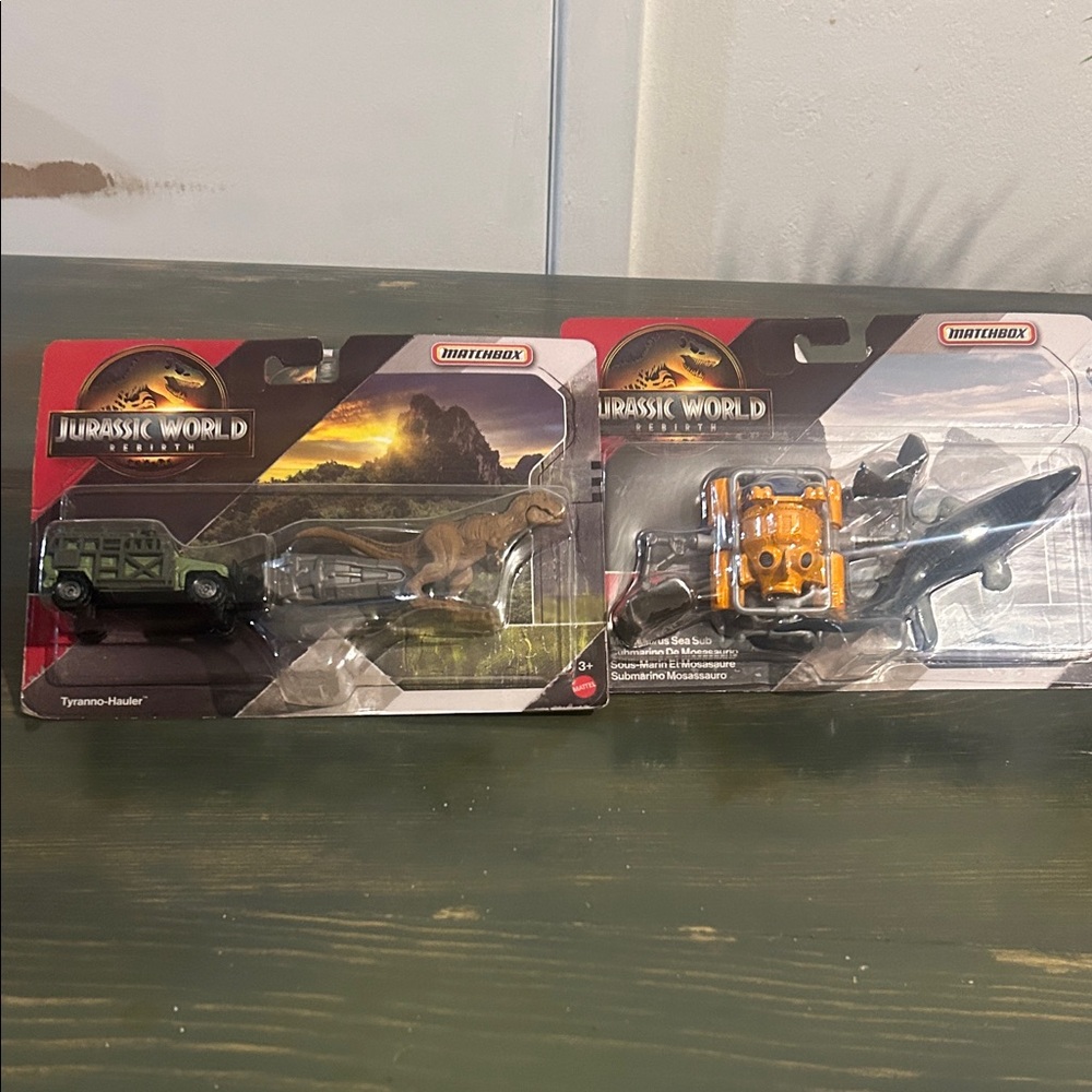 MATCHBOX SET OF 2 JURASSIC WORLD RBIRTH TYRANNO-HAULER & MOSASAURUS SEA SUB